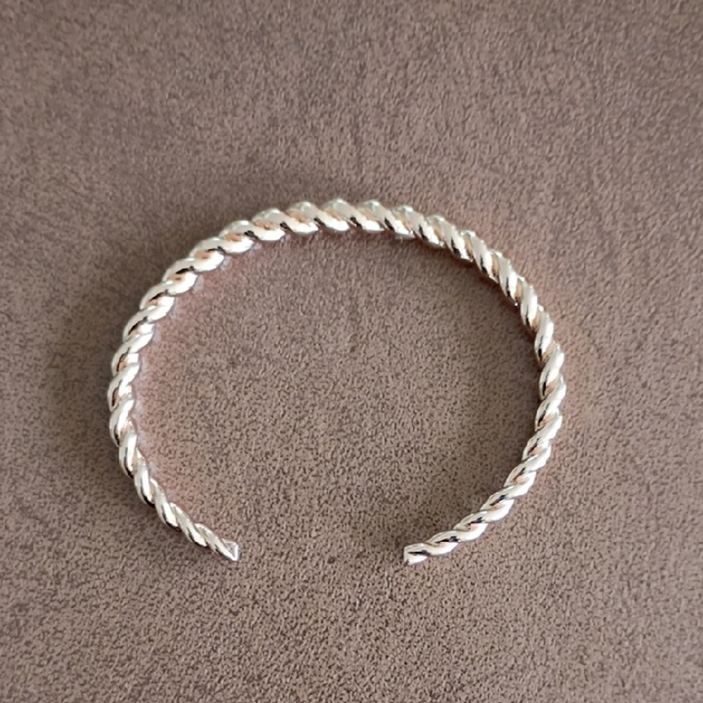 NWOT Rose Gold Plated Twisted Bangle Bracelet